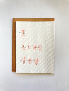 a card with the words i love you written on it