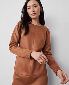 Elevate your wardrobe with the Ann Taylor Faux Suede Shift Dress, a piece that combines sophistication with comfort. This dress is perfect for any occasion, from office hours to evening outings.

- Size: 10 (Regular fit)
- Color: Sahara
- Material: Shell - 96% Polyester, 4% Spandex; Lining - 100% Polyester
- Gender: Female
- Features: Crew neck, bracelet sleeves, hidden back zipper with hook-and-eye closure, lined body
- Length: Hits above the knee
- Care Instructions: Machine washable

Crafted Knee Care, Neck Bracelet, Female Features, Petite Dresses, Office Wear, Above The Knee, Effortless Style, Faux Suede, Shift Dress