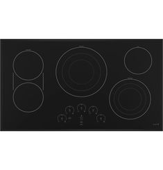 a black stove top with four burners