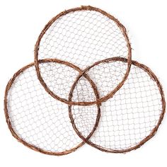 four brown wire baskets sitting on top of each other