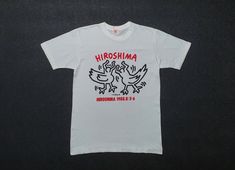 Up for sale very rare 1988 Keith Haring Hiroshima Festival t shirt, true vintage tee not a modern reproduction. Used T shirt, Show sign of minimal wear, minor yellowish on back neck, Overall still in good vintage condition (Please refer picture carefully) Shirt size is not available, Fit like Modern Small with actual measurement taken when lying flat armpit 18 inches and 25.5 inches in total lenght (Approx) Please note that vintage sizing is not the same as modern sizing.  Always go by the measu Keith Haring T Shirt, Hiroshima Japan, Japan Music, Doodle Icon, Festival T Shirts, Keith Haring, Art T Shirt, Vintage Tee, Hiroshima