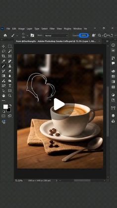 a cup of coffee on top of a wooden table