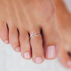 Wave Toe Ring | Pura Vida Bracelets Minimalist Sterling Silver Jewelry For Beach, Summer Beach Midi Rings, Bohemian Toe Ring Jewelry For Beach, Bohemian Toe Ring Jewelry For Summer, Trendy Stackable Summer Jewelry, Trendy Summer Stackable Jewelry, Summer Beach Metal Jewelry, Beach Toe Ring Jewelry, Dainty Nickel Free Jewelry For The Beach