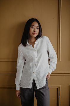 Made from 100% European flax Stone washed for maximum softness Made in Vilnius, Lithuania The Norkapp Shirt is a classic and chic linen shirt featuring seashell buttons, perfect for many different looks. Wear it to an interview, a professional meeting, or choose it for a more casual look with a pair of jeans. Model is 5'7" and wearing white in size XS/S. Care: Wash in cold or warm water on a gentle cycle. Best to dry naturally in a shady spot. No ironing is required and we recommend not using a Professional Meeting, Maternity Nightwear, Espadrilles Men, Jeans Details, How To Dress A Bed, Rosy Brown, Nightwear Women, Casual Look, Linen Shirt