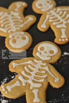 some cookies that have been decorated to look like skeletons