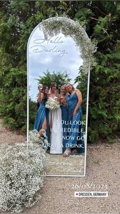 three bridesmaids are standing in front of a large mirror with the words, do you