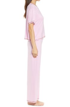 Short-sleeve pajamas in a blissfully soft knit you'll want to live in are traced with colorful embroidery. 21 1/2" top length; 28" inseam; 10 1/2" leg opening; 11 1/2" front rise; 14 1/2" back rise Top has crewneck; short sleeves Pants have drawstring waist 95% rayon, 5% spandex Machine wash, line dry Imported Feminine Short Sleeve Sleepwear With Relaxed Fit, Feminine Relaxed Fit Short Sleeve Sleepwear, Spring Loungewear Nightgown Relaxed Fit, V-neck Tops For Sleepover In Spring, V-neck Tops For Spring Sleepover, Spring Short Sleeve Nightgown For Loungewear, Short Sleeve Spring Loungewear Sleepwear, Spring Loungewear Sleepwear With Short Sleeves, Fitted Short Sleeve Nightgown For Loungewear