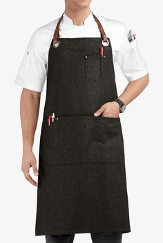 a man in an apron is standing with his hands on his hips