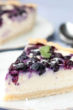 a slice of blueberry cheesecake on a plate