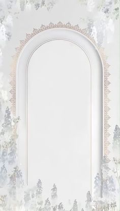 an arch in the middle of a white wall with flowers on it and a light colored background