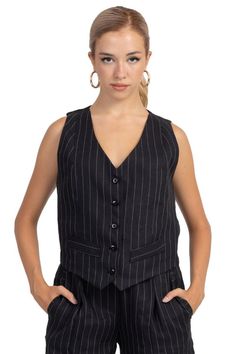 Black pinstriped patterned vest, Argentine Tango vest for women, Ladies elegant suit vest, Tailored pes waistcoat, V neck vest with buttons Black Pinstripe Women's Suit Vest Balance your feminine and masculine energy with this wardrobe staple waistcoat.  Pair it with the matching pinstripe trousers : https://www.etsy.com/listing/1555866711/black-pinstriped-patterned-pants-womens or your favorite jeans for a casual look. ✤ Fabric Pes ✤ Pinstriped Pattern ✤ V-Neckline ✤ Front Button Closure ✤ Fron Chic Striped V-neck Vest, Sleeveless Pinstripe Tops For Work, Pinstripe Sleeveless Tops For Work, Elegant Fitted Pinstripe Tops, Classic Black Summer Vest, Black Formal Summer Vest, Black Summer Formal Vest, Tailored Pinstripe Sleeveless Vest, Pinstripe Tailored Sleeveless Vest