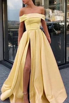 Welcome to our store.This dress could be custom made.there are no extra cost to do custom size and color.Service email: service@winkbridal.com. Item Detail: 1. Silhouette: A Line2. Hem-length:Floor Length3. Fabric:Satin4. Neckline:Off The Shoulder5. Sleeve: Off The Shoulder6. Embellishment:Slit7. Back Details:Zipper8. Lining:Boned And Fully Lined 9. Build-in Bra: Yes10. Size: Standard Size or Custom Size11. Picture Color:Light Blue/Yellow/Pink/Champagne(For custom color,please check our color ch Yellow Prom Dresses Long, Long Elegant Prom Dresses, Yellow Formal Dress, Burgundy Homecoming Dress, Yellow Prom, Split Prom Dresses, Prom Dresses Yellow, Elegant Prom Dresses, Rock Punk