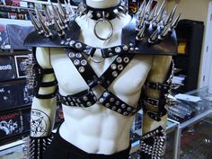 ADJUST SIZE,6 SNAP-PL EASEMENT BACK-CLOSURE. KILLER SCREW-BACK 2 3/4" GIANT  CHROME SPIKES... THE ARMOR IS MADE OF 1 1/8" GENUINE LEATHER. ADJUSTABLE TO YOUR TO YOUR BODY. THE ARMOR IN THIS PICTURE IS A ADJUSTABLE. THE QUALITY OF THIS ARMOR WILL LAST A LIFETIME.   MDLH0090 ....NO INCLUDED CHOKER & ARMBANDS  HIGH QUALITY HANDCRAFTED SPIKED ARMOR.MADE OF HIGH-QUALITY BLACK LEATHER ANOTHER METAL DEVASTATION STAGE GEAR CREATION  SHIPPING:  free 4 days shipping in the U.S.A PRIORITY LARGE FLAT RATE Spiked Armor, Leather Gauntlet, Drag King, Alternative Outfits, Edgy Outfits, Character Outfits, Festival Bra, Arm Band, Black Metal