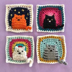 four crocheted squares with cats and dogs in them on a purple tablecloth