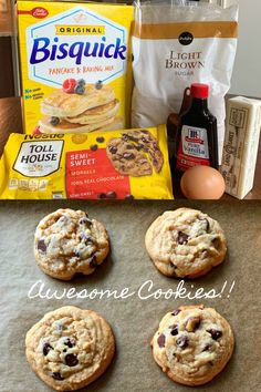 cookies, milk, and eggs are sitting on a baking sheet next to the bag of biscuits