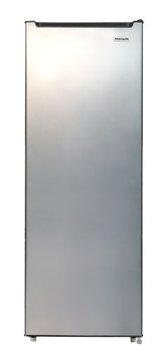 a silver refrigerator freezer sitting on top of a white wall