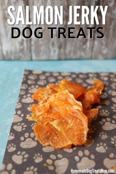 a close up of some dog treats on a table with the words salmonjerky dog treats above it