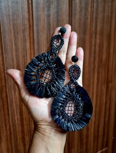 Statement Bold Black Raffia Oversized Danglers. These unique and stunning choice for a dramatic yet comfortable earrings are handcrafted and handwoven, with intricate detailing with a bold black raffia design. Despite their oversized appearance, they are incredibly lightweight, ensuring you barely notice them on your ears. Available in three unique and beautiful patterns, these earrings combine eye-catching style with exceptional comfort. They're perfect for adding a touch of elegance and sophis Raffia Earrings, Comfortable Earrings, Bold Earrings, Black Earrings, Earrings Black, Bold Black, Beautiful Patterns, Jewelry Earrings Dangle, Etsy Earrings