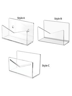 three clear acrylic boxes with different styles and sizes