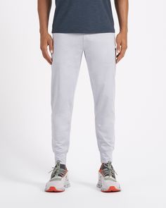 A fresh take on athleisure and a staple in your wardrobe, the Sunday Performance Joggers are premier in fit, function and soft stretch. This jogger style will keep you moving with less bulk around your ankles. | Vuori Sunday Performance Jogger Pants | Platinum Heather | XXL Vuori makes premium performance apparel inspired by the active Coastal California lifestyle; an integration of fitness, surf, sport, and art. Breaking down the boundaries of traditional activewear, we are a new perspective on 4-way Stretch Sportswear Joggers With Side Pockets, Sportswear Bottoms With 4-way Stretch, Sportswear Bottoms With Go-dry Technology, Functional Activewear With Pockets For Loungewear, Sporty Recycled Polyester Bottoms With Relaxed Fit, Athleisure Go-dry Long Bottoms, Athleisure Go-dry Long Pants, Sporty Relaxed Fit Bottoms In Recycled Polyester, Go-dry Athleisure Bottoms Long Pants