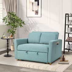 a living room scene with focus on the blue chair