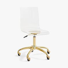 a clear office chair with gold wheels on an isolated white background in front of a plain backdrop