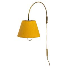 Kalmar wall lamp with original fabric shade around 1950s The shade hight is adjustable and it is swiveling Hight adjustable from 50cm - 81cm Original condition Original fabric shade. Glass Panel Wall, Brass Wall Lamp, Long Walls, Glass Wall Lights, Wood Shades, Modern Wall Lights, Light Project, Light Sconces, Glass Texture