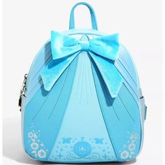 This Loungefly Disney Cinderella Dress Cosplay Mini Backpack Is Like A Wonderful Dream Come True! Features A Velvety Bow, Pleated Satin Fabric On The Front, Die-Cut And Debossed Details, Silver Foil Graphics, Interior Lining With An Allover Icon Pattern, An Interior Zip Pocket, A Jaq And Gus Gus Zipper Pull, Brand Badge, 2 Side Pockets, And Adjustable Straps. Approx. 9" X 11" X 4 1/2" Polyurethane; Polyester Lining Jaq And Gus Gus, Disney Cinderella Dress, Cinderella Dress Disney, Elegant Backpacks, Gus Gus, Cinderella Dress, Beautiful Backpacks, Disney Cinderella, Loungefly Bag