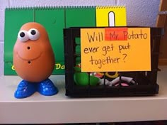 there is a sign that says will mr potato ever get put together? on the shelf