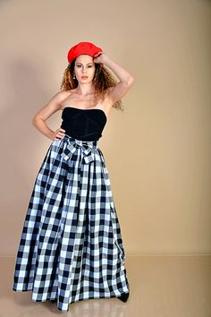 "This beautiful 80s black and white checkered skirt is made out of high quality soft cotton fabric. It is high waisted and has a separate 2,5m (8ft) long belt, made of the same fabric as the skirt and a hidden zipper on the side. You can tie the belt into a bowtie or however else you want. Pockets can be sewn in if you want to. Perfect for any day, that is special to you. Care: hand wash and hang dry Available Size: XS, S, M, L, XL, 2XL, 3XL, 4XL, 5XL, 6XL, 7XL, 8XL The model wears size M - 5,7' Plaid Cotton Long Skirt, Plaid Long Cotton Skirt, Long Plaid Cotton Skirt, Plaid Cotton Flared Skirt, Cotton Plaid Flared Skirt, Gingham Cotton Skirt, Fitted Cotton Gingham Skirt, Cotton Gingham Skirt, Retro Plaid Cotton Skirt