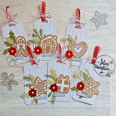 four tags with christmas decorations on them