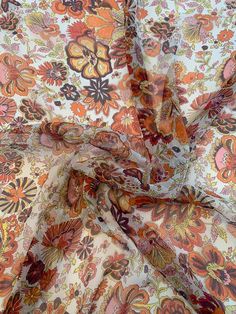 This multicolor floral harvest printed crinkled silk chiffon designer fashion fabric in orange and red features a cushion of color in festive seasonal shades. SKU: 8675 Content: 100% Silk Color: Orange / Red / Multicolor Width: 54 inches Luxury Multicolor Fabric For Festive Season, Luxury Multicolor Festive Fabric, Fall Florals Fabric, Luxury Orange Floral Print Sets, Orange Chiffon, Novelty Fabric, Brocade Fabric, Silk Organza, Silk Twill