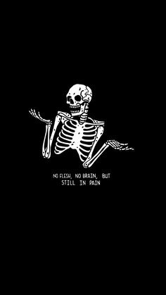 a skeleton sitting in the middle of a black background