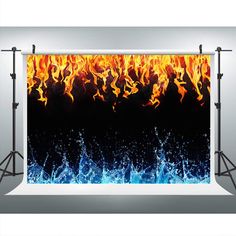 an image of fire and water on a black background with blue flames in the foreground