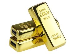 two gold bars sitting side by side on top of each other with the words fine gold