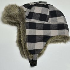 Nwt Eddie Bauer Hadlock Faux Fur Trapper Hat Size S/M This Classic Eddie Bauer Trapper Hat Is In A Gray/Black Buffalo Plaid. It Features A Faux Fur Lining And Insulation Making It The Perfect Winter Hat For Those Cold Days. The Convertible Ear Flaps Are Also Lined With A Soft Faux Fur And There's A Snap Under The Chin. The Ear Flaps Can Be Worn Up Or Down; And You Can Snap The Hat Under Your Chin Or Snap On Top Of Hat. The Hat Brim Is Also Convertible With Snaps So That You Can Wear The Brim Up Plaid Bucket Hat, Fur Trapper Hat, Fur Trapper, Fleece Headbands, Floppy Sun Hats, Faux Fur Hat, Trapper Hat, Summer Sun Hat, Trapper Hats