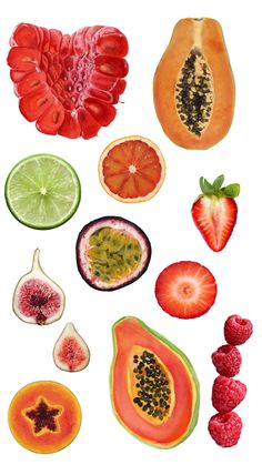 various fruits cut in half on a white background