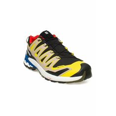 a black, yellow and red sneaker on a white background