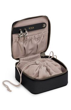 Let your jewelry travel in luxe comfort with this leather jewelry case designed to organize earrings, necklaces and rings when you're on the go. Zip-around closure Lined Leather Imported Camera Bag Backpack, Earring Hole, Anti Theft Bag, Travel Jewelry Organizer, Snowboard Bag, Rfid Blocking Wallet, Anti Theft Backpack, Accessories Packing, Earring Organizer