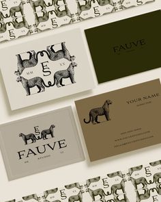 three business cards with animals on them