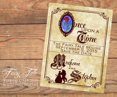 the fairy tale begins save - the - date card is displayed on a wooden table