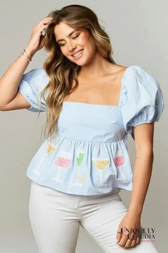 Cheers To You Peplum Top | Uniquely Claudia Boutique Spring Square Neck Printed Tops, Printed Short Sleeve Tops For Brunch, Summer Cotton Tops With Square Neck, Chic Cotton Top For Brunch, Cotton Tops With Square Neck For Summer, Spring Vacation Tops With Square Neck, Cotton Square Neck Tops For Summer, Summer Party Blouse With Short Sleeves, Trendy Printed Puff Sleeve Tops