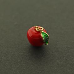 Check out these super cute red enamel apple charms... They are made of 18k gold plated brass. You will receive 1 charm. Measurements: 9.5mm x 10.5mm These charms are lead, nickel and cadmium free. We recommend avoiding moisture and chemicals as they can impact the finish of the charm. You can clean them easily with a small amount of warm water and a q-tip. Q Tip, Enamel Charms, Warm Water, Chemicals, Charm Necklace, 18k Gold, Gold Plate, Charms, Plating