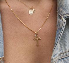 This beautiful gold filled cross necklace is perfect for the trendy girl. The gothic cross with the diamond charm makes it so unique and beautiful. This cross necklace is medium sized we also have a dainty version of this necklace:  https://www.etsy.com/listing/639889287/dainty-cross-necklace-small-cross-charm?ref=related-6 Details: -1 detailed 14k gold filled medium sized cross  -1 simulated diamond charm. - On a 14k gold filled curb chain.  Made to live in. Gold Filled Jewelry is the next best thing to solid gold! W H A T   M A K E S   X O   H A N A L E I    S P E C I A L  -  We lived and studied jewelry design in Florence Italy which is where a lot of our brand inspiration comes from - Our brand name was inspired by the town we grew up in: Hanalei, Kauai.  - we use only the finest quali Cross Necklace Dainty, Chunky Cross Necklace, Big Cross Necklace, Large Cross Necklace, Gothic Cross Necklace, Cross Necklace Gold, Ornate Cross, Cross Choker Necklace, Tiny Cross Necklace