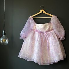 Fanciful Doll Floral Organza Mini Babydoll Dress Purple Pink Size Small Sizing Is Based Off Bust Only. Arms Are Roomy And Dress Has No Waist. These Dresses Were Made To Order. Color Is A Blush Pink Purple Hue. Deeply Romantic Organza Babydoll With Puff Sleeves Which Will Make You Feel Supremely Girly And Romantic! High Quality 5 Layer Skirt - The Most Extreme Puff Effect You Will Find, Reinforced Bodice Acts Like A Bra With Light Padding To Maintain Shape - Flatter Your Curves! Lined Floral Ties Layered Skirt, Babydoll Dress, Purple Hues, Purple Dress, Floral Tie, Doll Dress, Pink Purple, Blush Pink, Baby Dolls