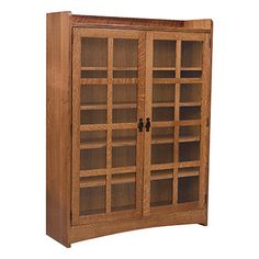 a wooden bookcase with glass doors on the front and bottom shelves in various sizes