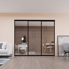 a living room filled with furniture next to a white couch and table on top of a hard wood floor