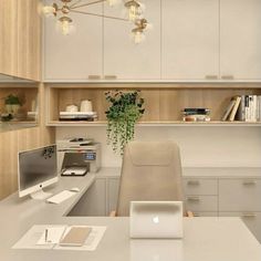 a desk with a laptop computer sitting on top of it next to a book shelf