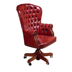 a red leather office chair sitting on top of a wooden desk