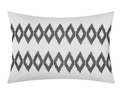 a black and white pillow with an intricate design on the front, in grey and white